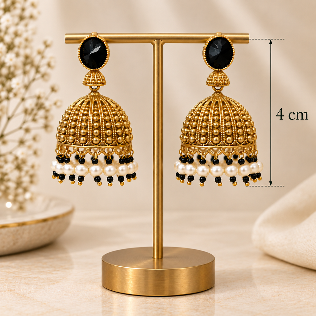 Black and gold Jhumka earrings displayed on a metal stand with a 4 cm measurement